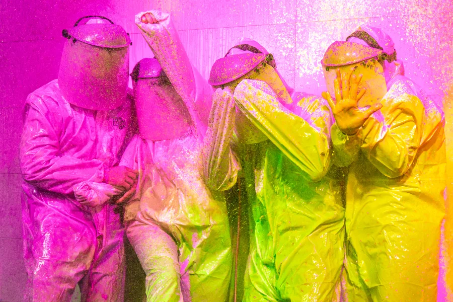 A group working through a Boom Lab room together